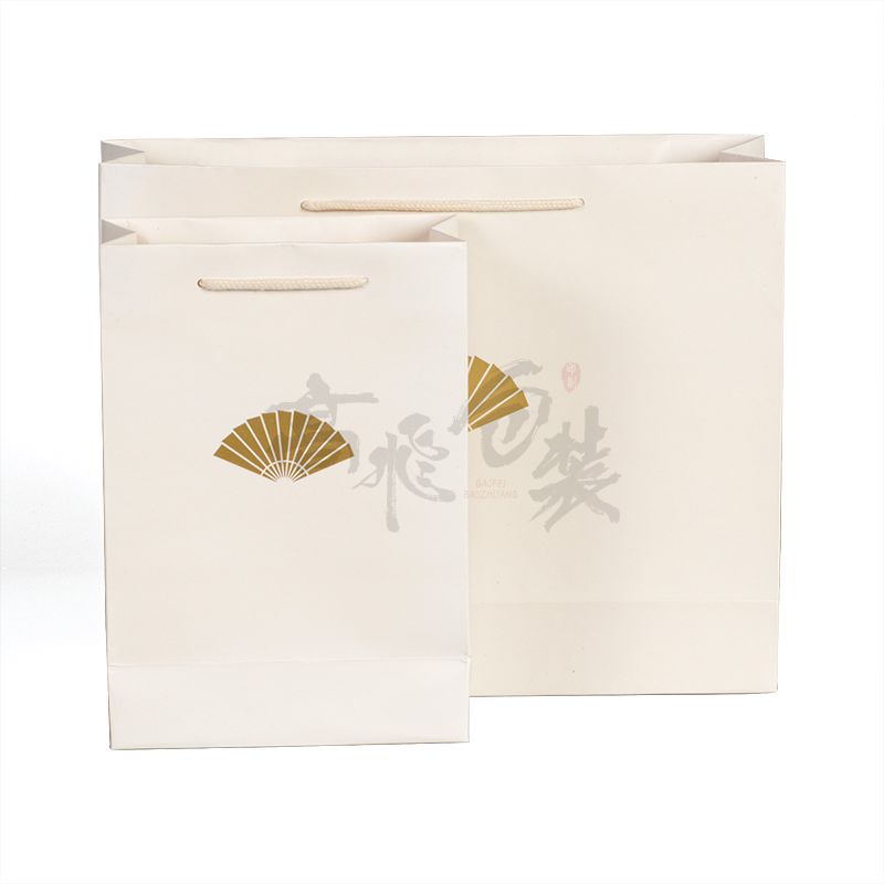 New Gold Logo Hot Foiled Stamping White Paper Bag With Cotton Rope Handles
