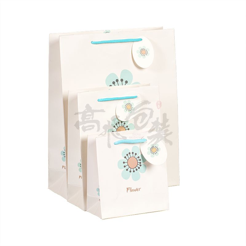 OEM Service Custom Logo waterproof glossy Shopping paper bag for clothes