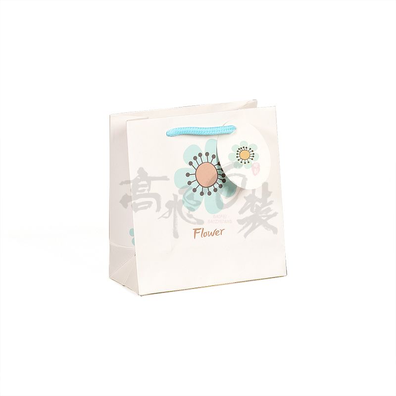 OEM Service Custom Logo waterproof glossy Shopping paper bag for clothes