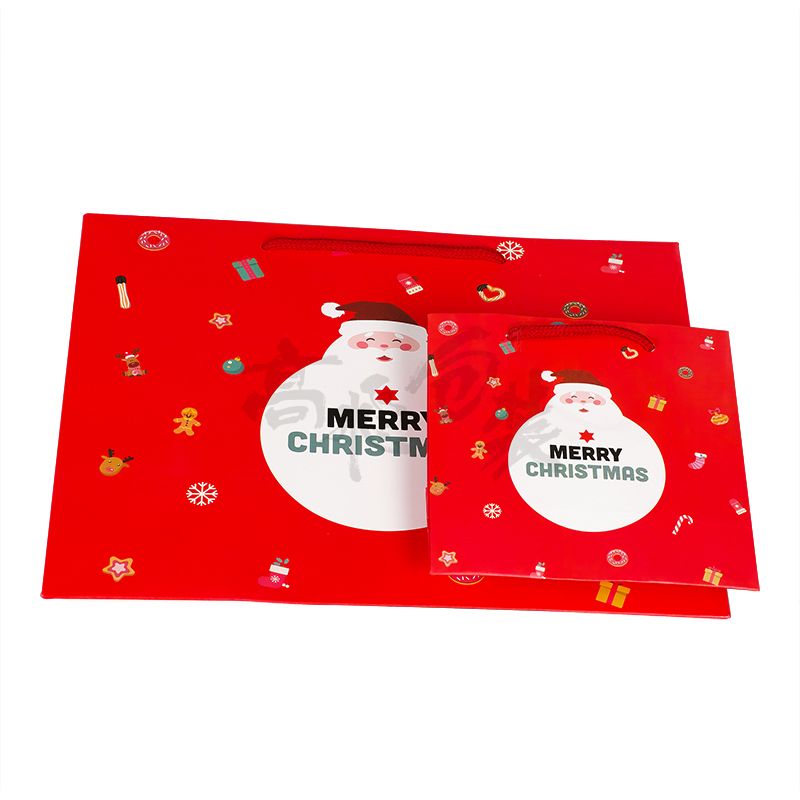 Custom Red Recyclable Merry Christmas and Reusable Flat Foldable Candy Packaging Paper Bag with Rope Handle