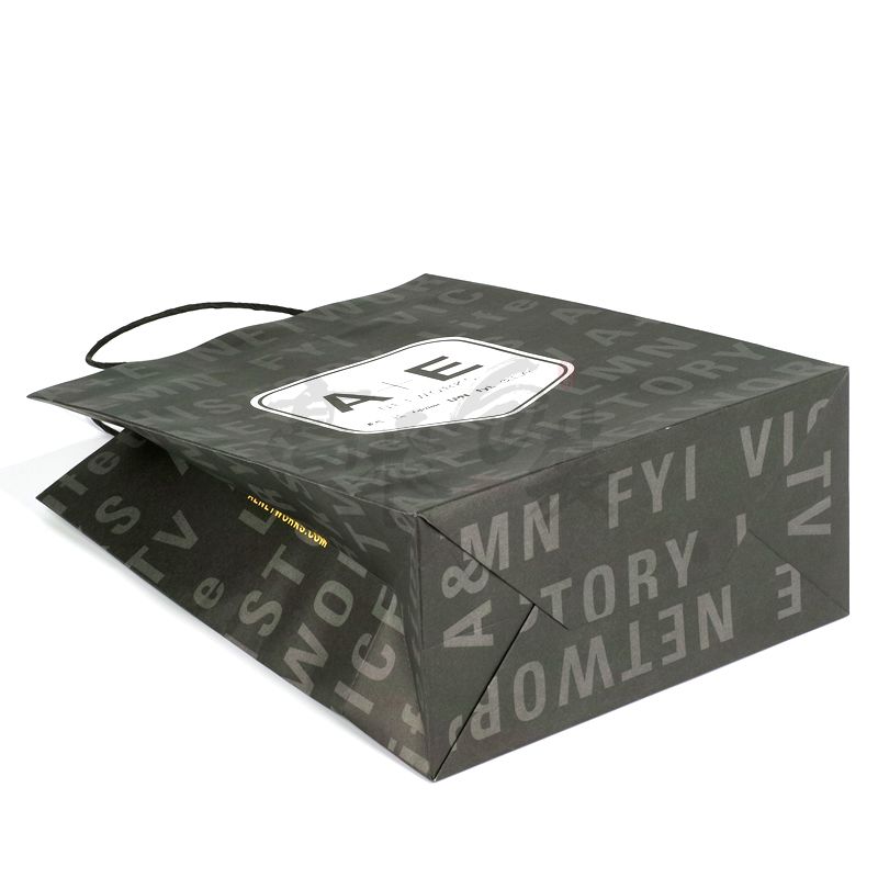 kraft jean packaging paper gift bags with ribbon handle in bulk wholesale for clothing
